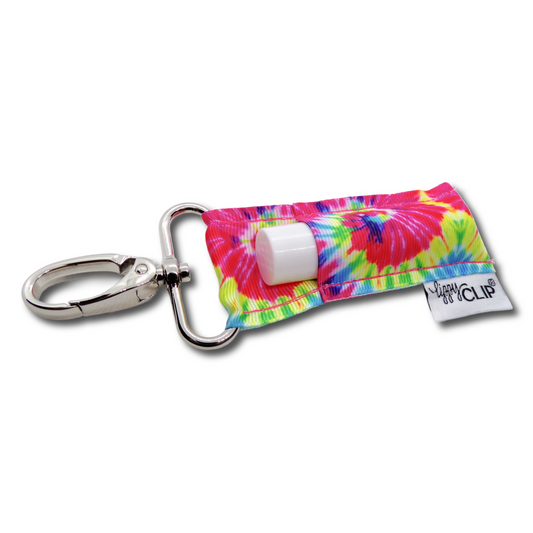 Tie-dye keychain with lip balm holder on a white background