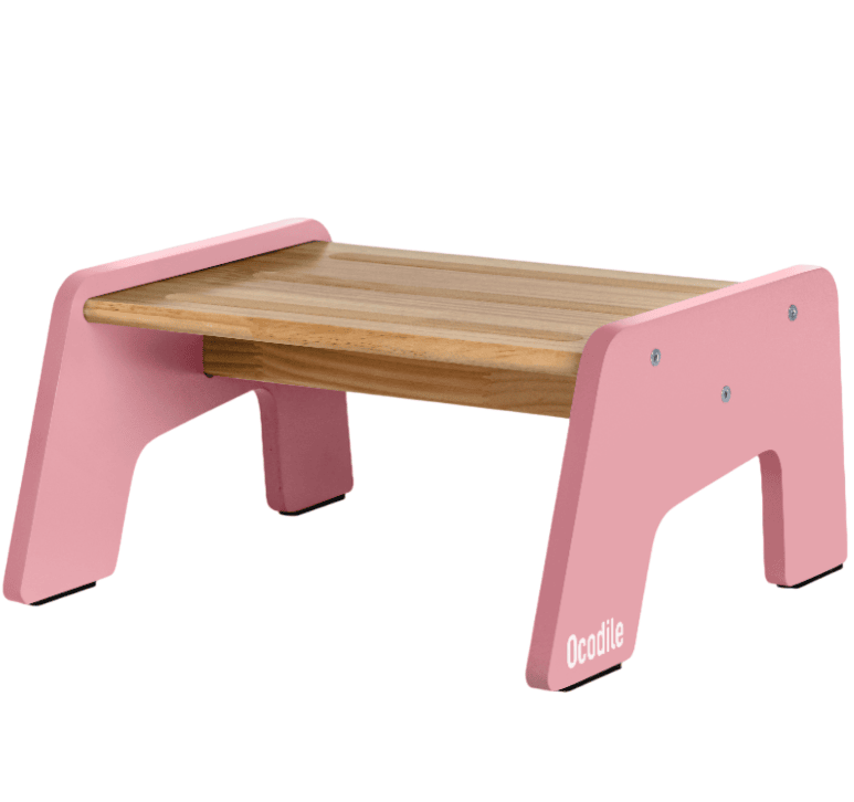Kids step stool in pink with light wood top and Ocokide branding