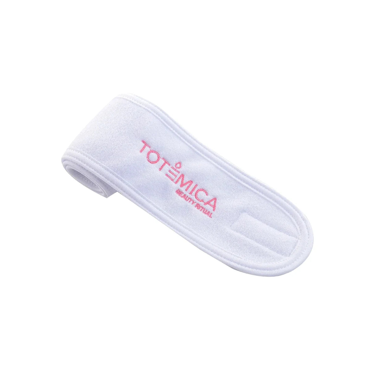 White terry spa headband with Totemica logo and adjustable strap