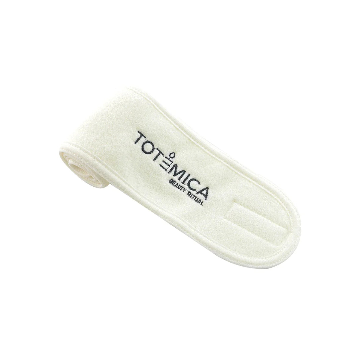 Cream terry spa headband with Totemica logo and adjustable strap