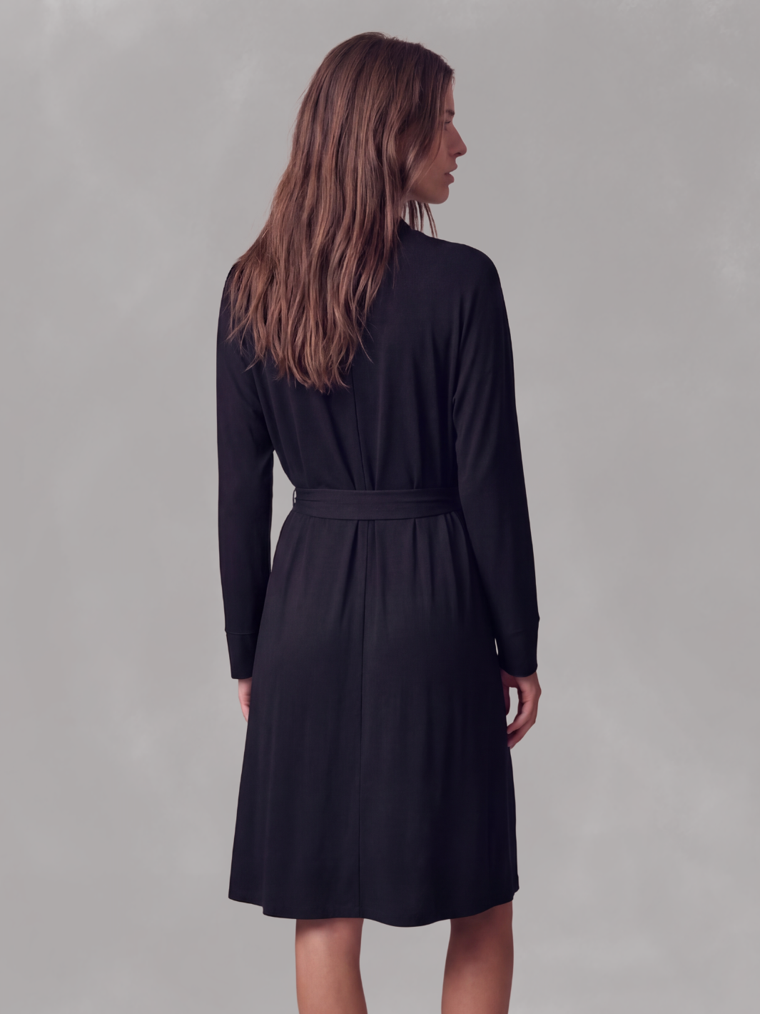 Black wrap robe with long sleeves, waist belt tie, back view