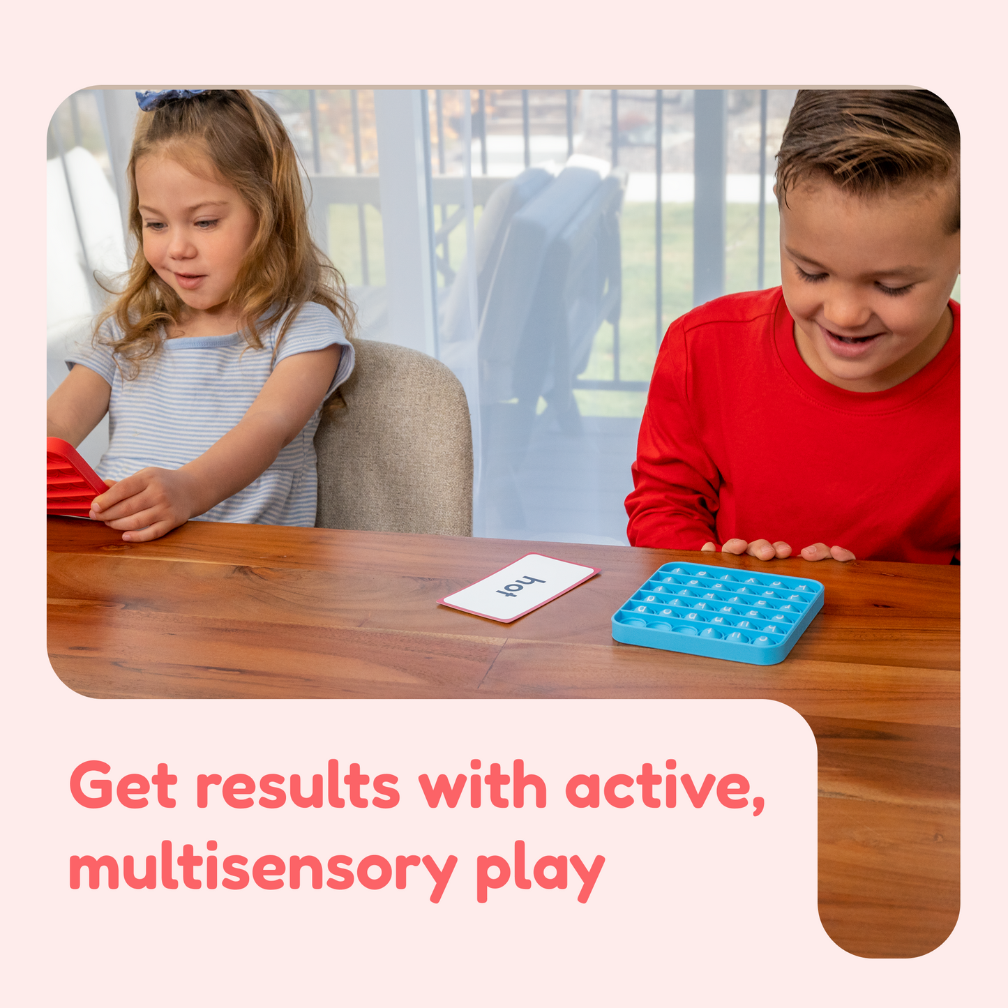 Word Pop bubble fidget mats with word cards on a wooden table