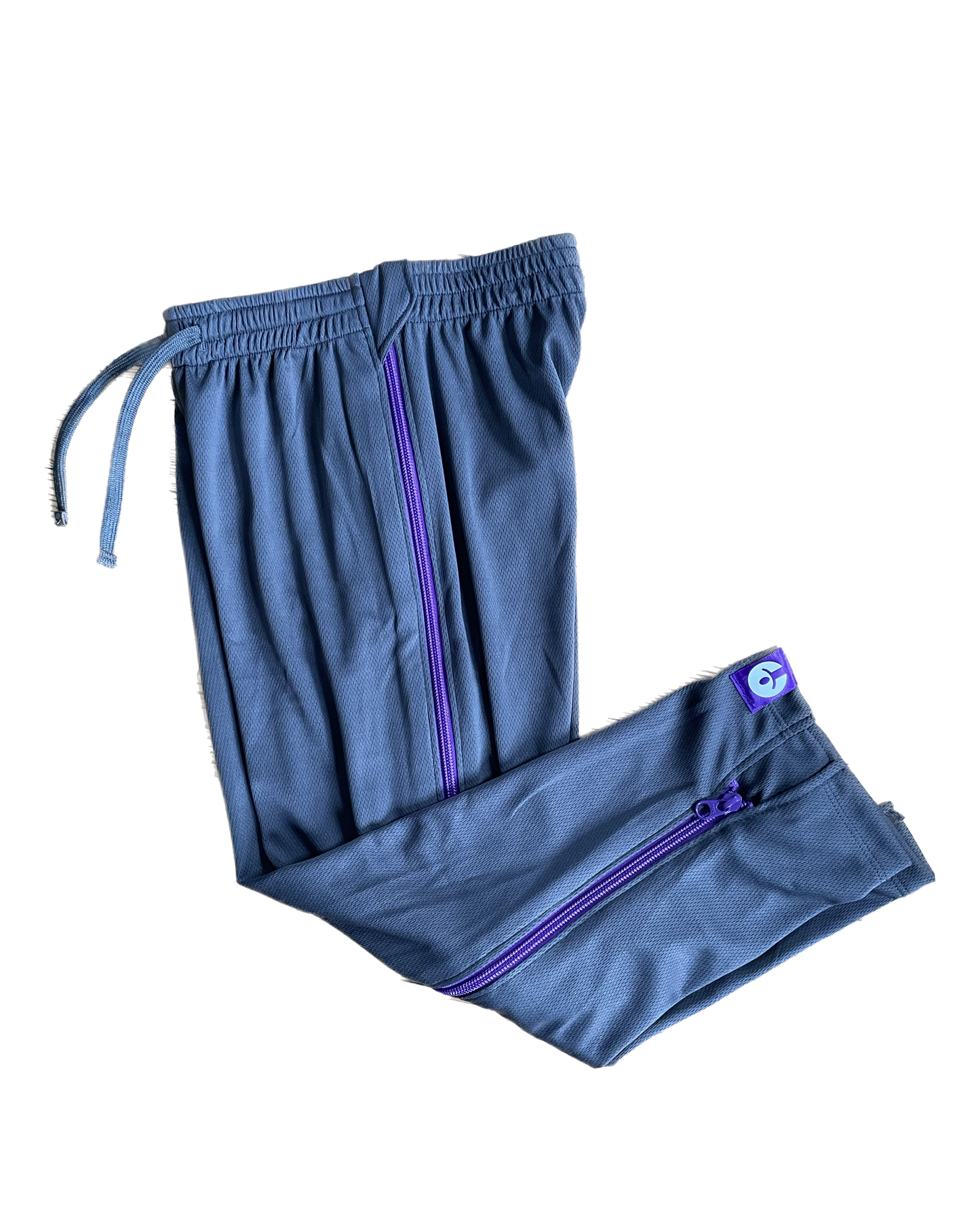 Blue tracksuit with purple zippers on a white background