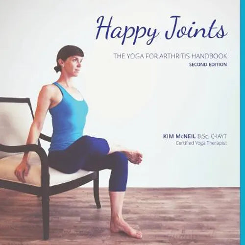Paperback yoga handbook cover with seated woman performing stretch pose