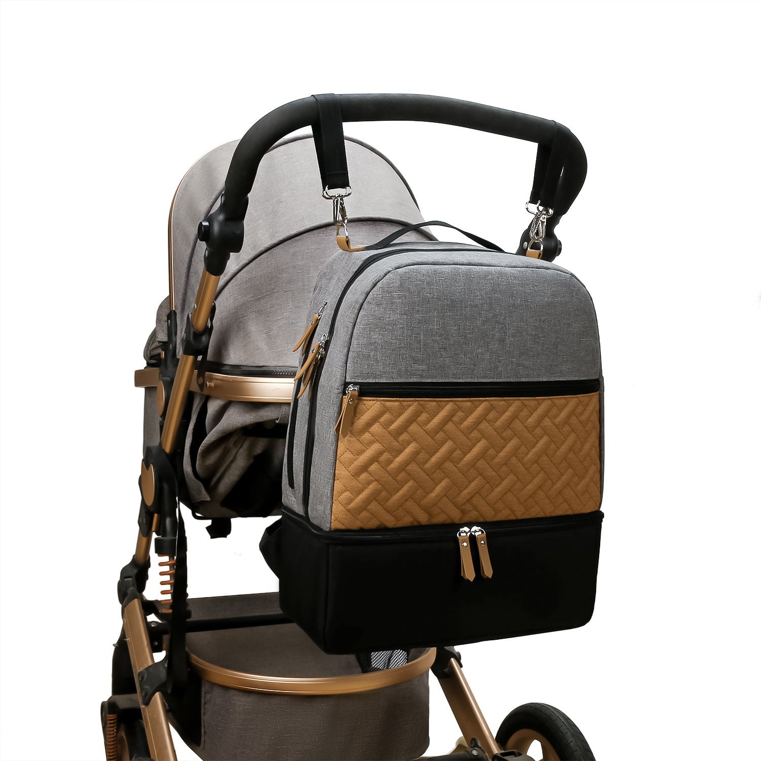 Gray insulated travel mummy bag attached to stroller with tan quilted front pocket
