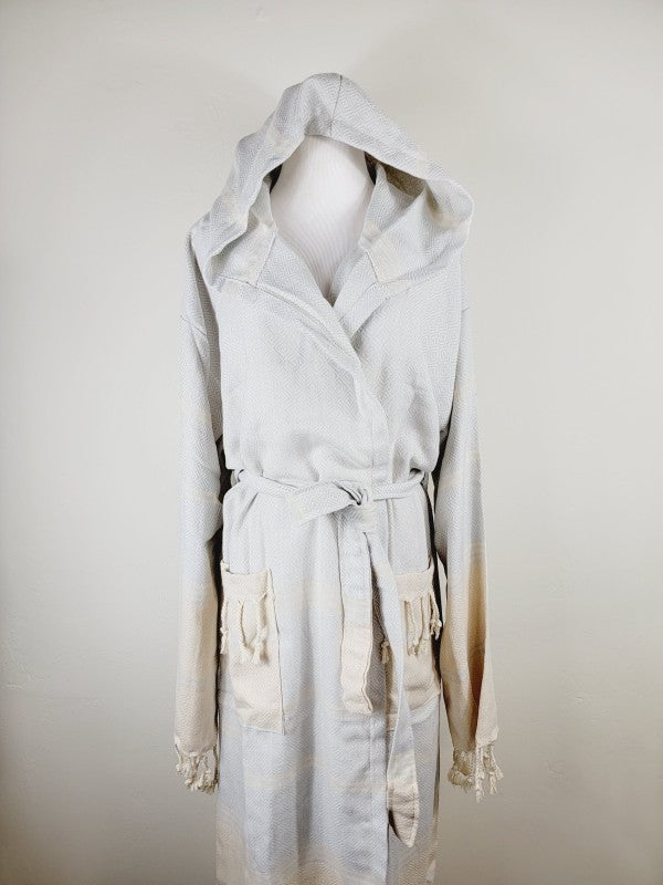 Light white unisex hooded robe with belt and front pockets, textured fabric