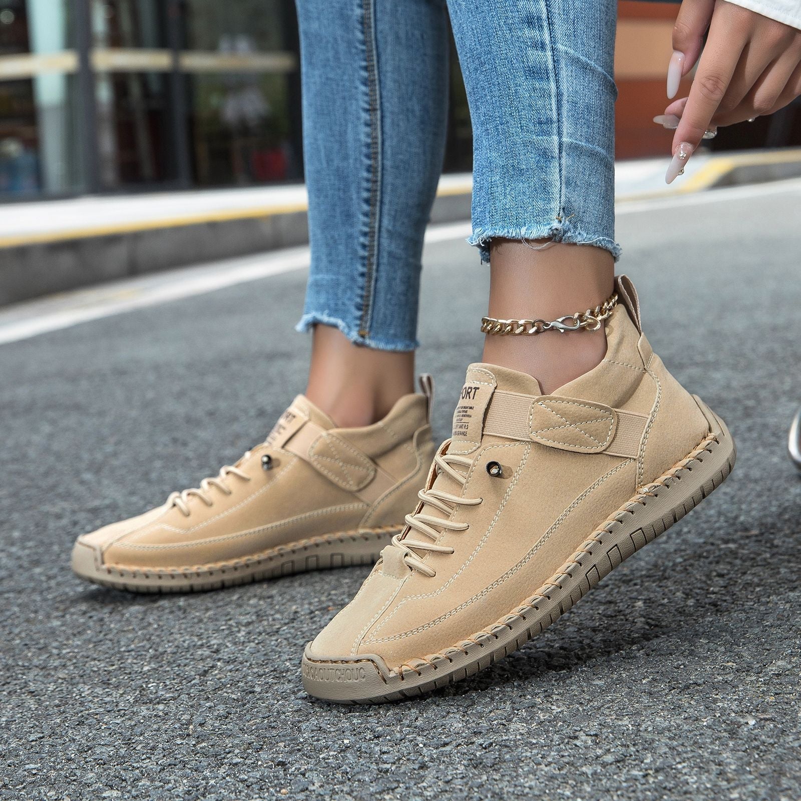 Casual leather boots in beige/tan with lace-up front, side strap, and textured sole.
