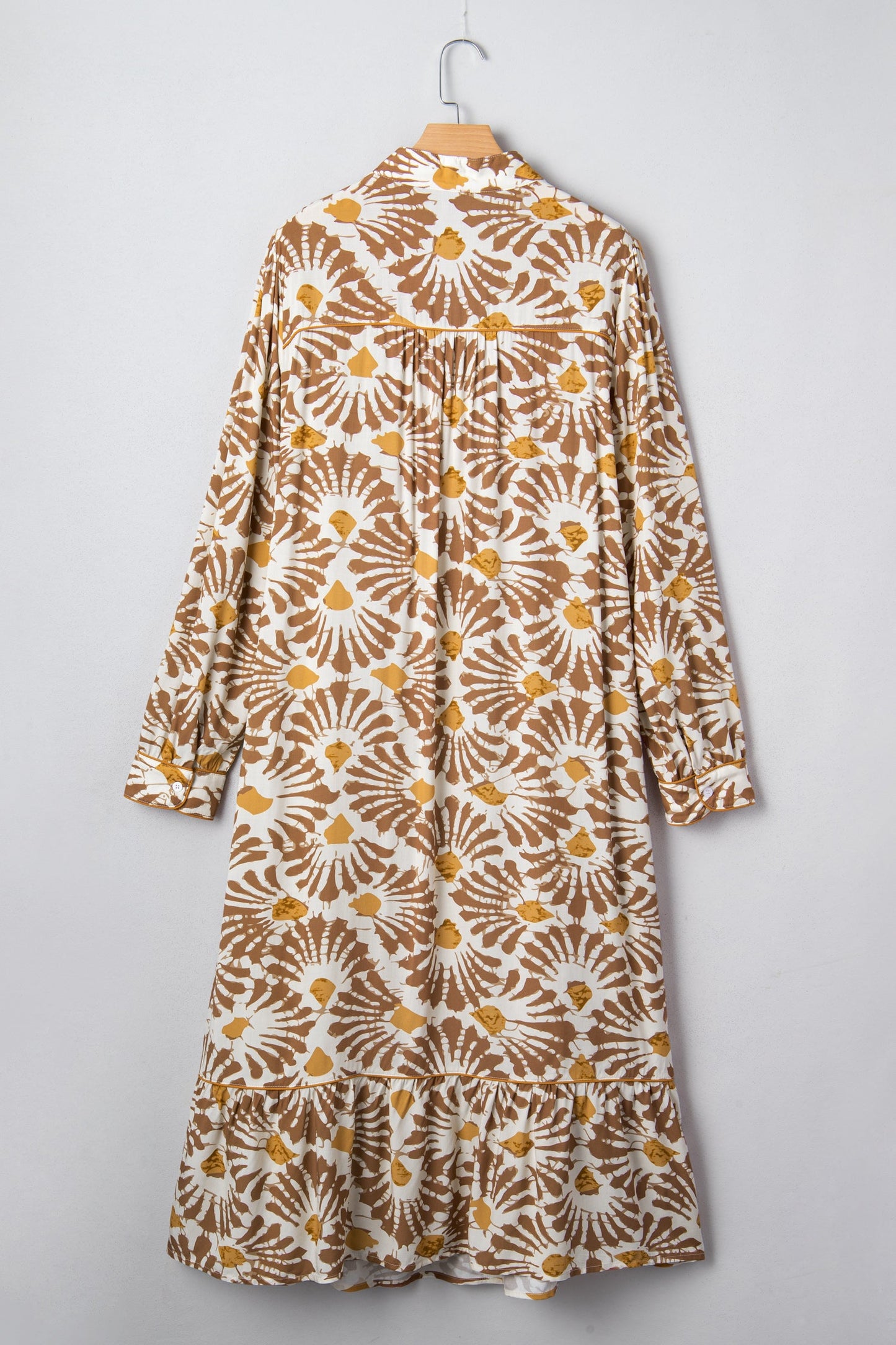 Hanging plus size long dress in khaki with gold floral swirl print, back