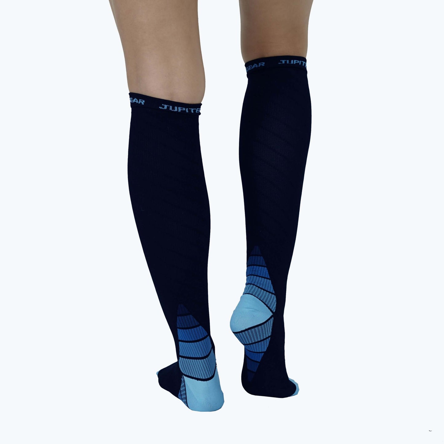 Navy compression socks with blue striping on foot and light blue heel/toe accents