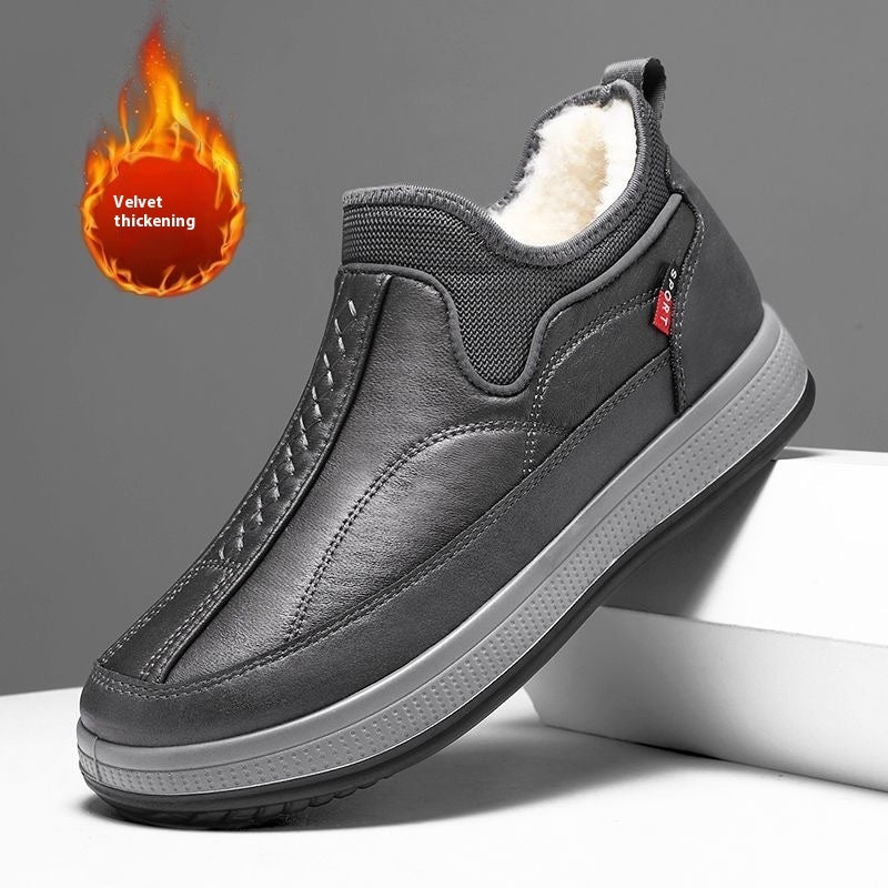Black leather-look ankle boots with fleece lining and textured platform sole