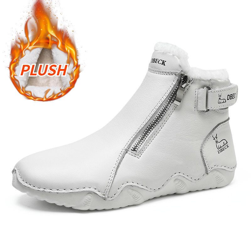 White high-top boot with side zipper and plush lining at the opening; thick tread sole.