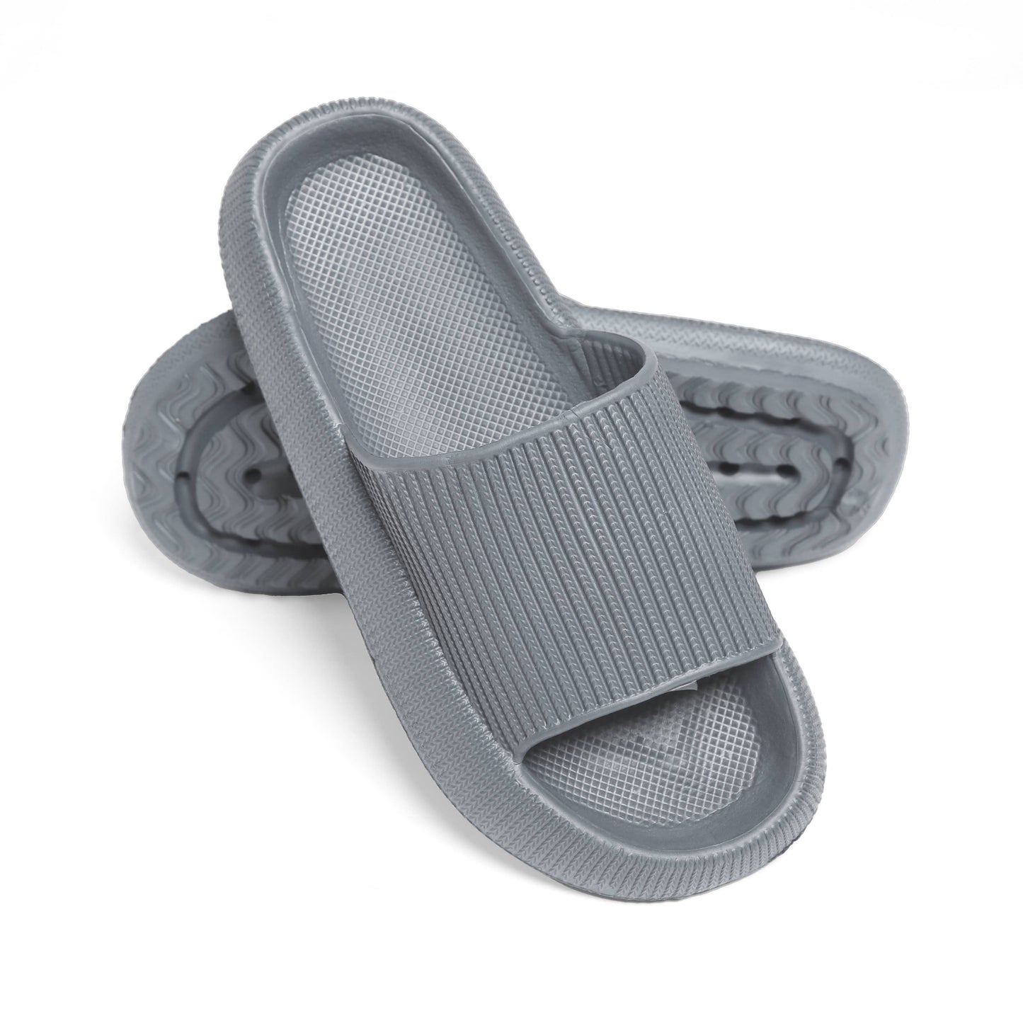Gray slide sandals with wide strap and visible treaded sole underside