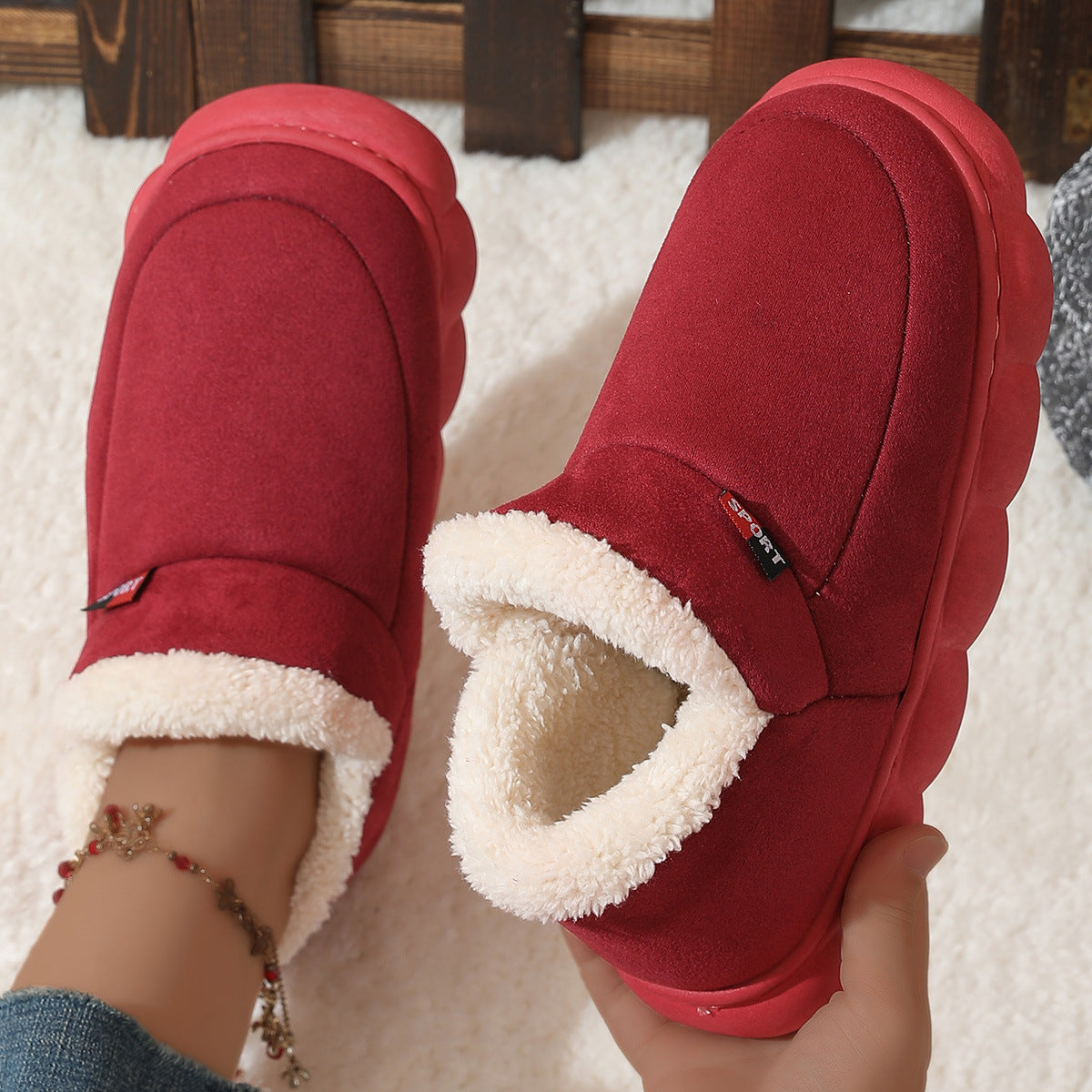 Wine red plush house shoes with fuzzy strap and thick white sole