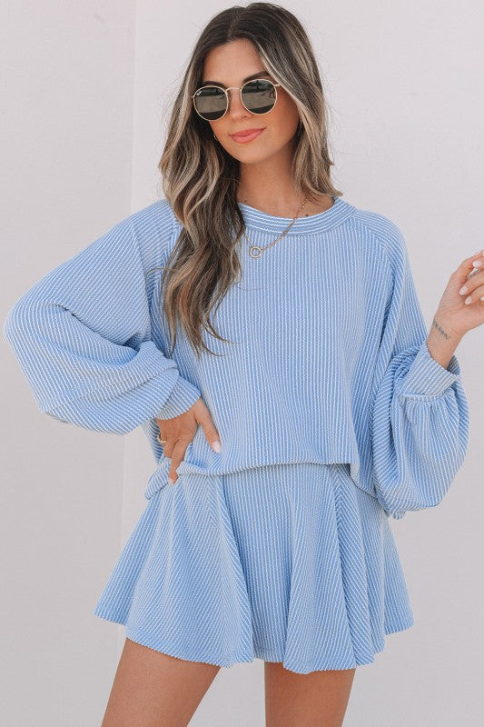 Corded top and ruffle mini skirt set in sky blue striped knit, long sleeves