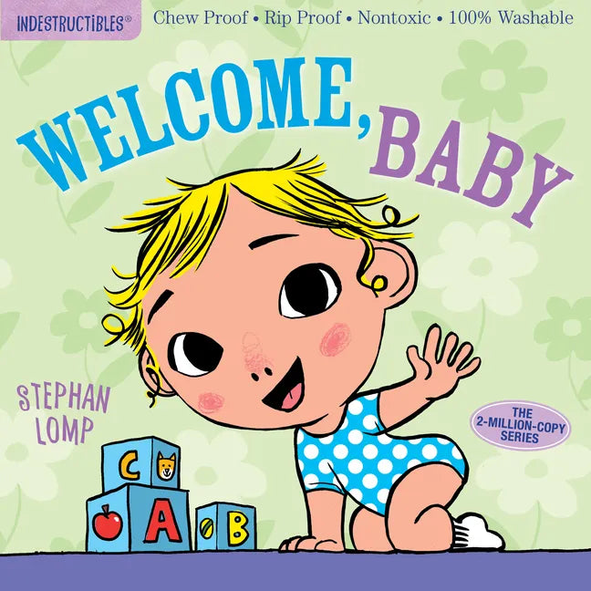 Chew-proof baby book cover with illustrated infant and letter blocks