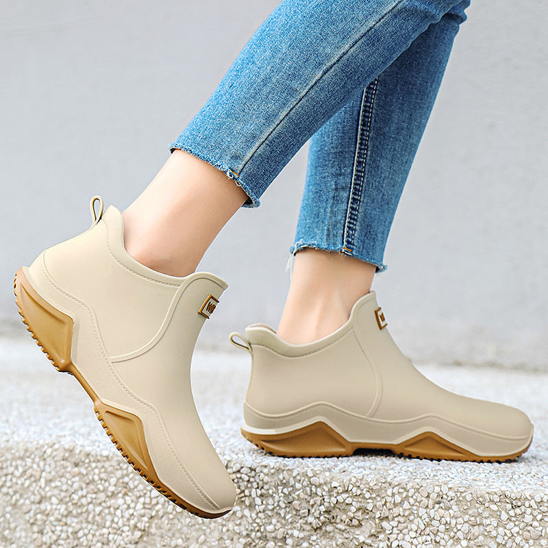 Men's short rain boots in off-white with tan outsole and side logo patch