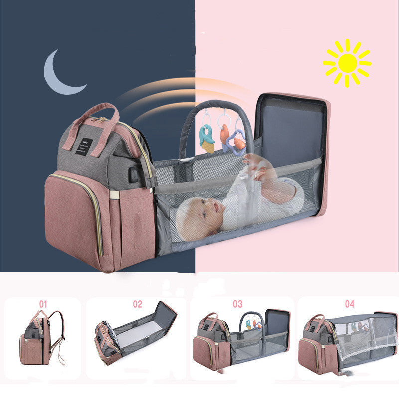 Insulated baby crib backpack, gray and mauve, open mesh side with clear viewing panel