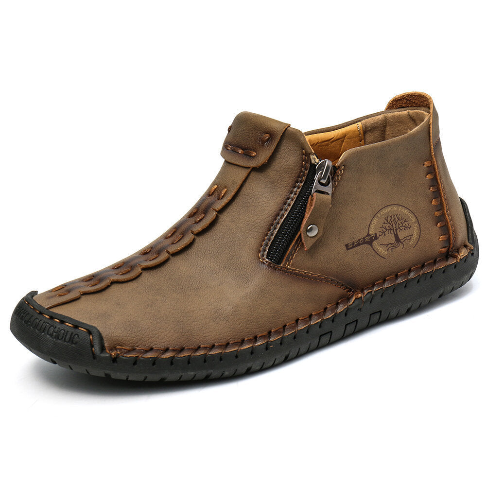 Men's ankle boots in dark tan with side zipper and stitched moc-style toe design