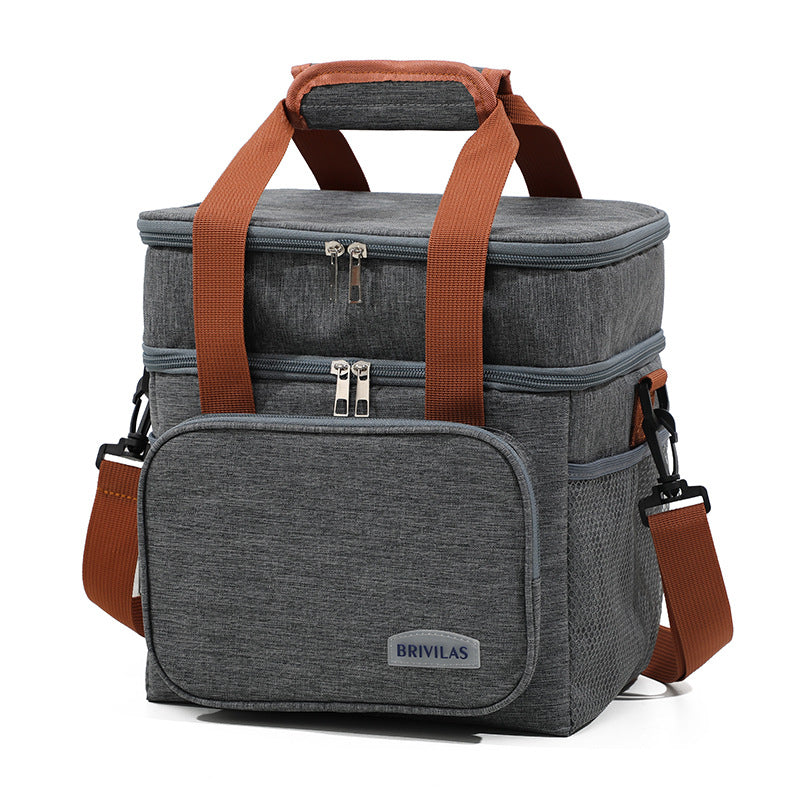 Gray insulated lunch bag cooler crossbody with orange webbing straps and front panel pocket