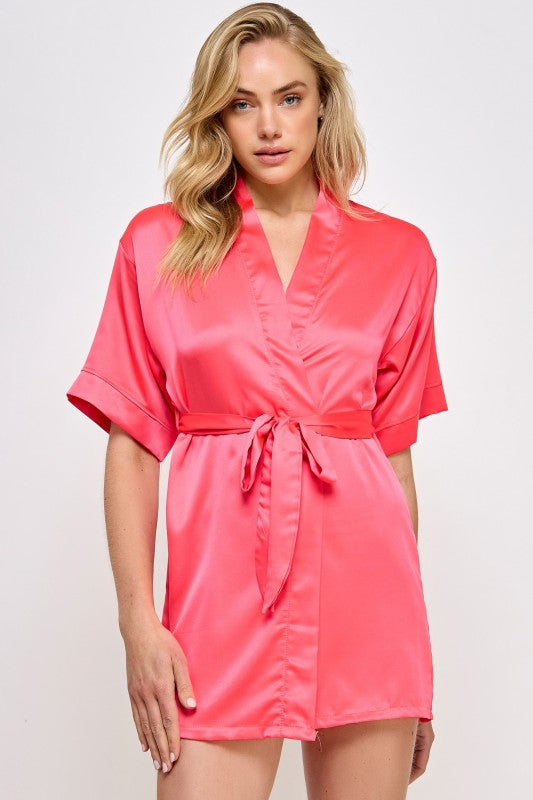 Hot pink satin V-neck robe with tied waist belt and short sleeves