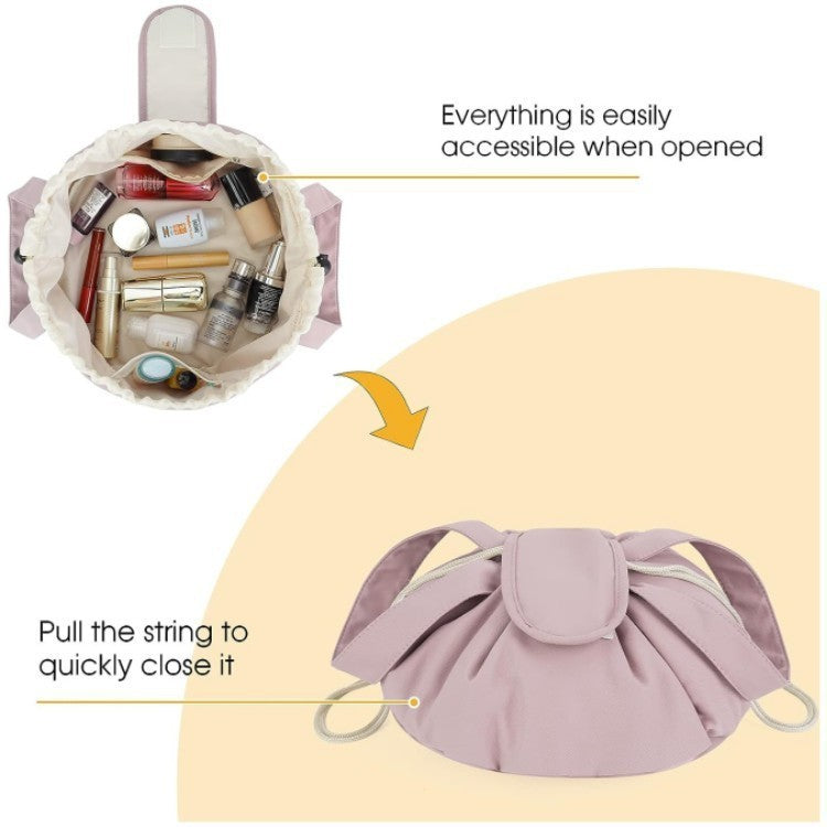 Lavender drawstring makeup bag with bow top, open interior and cosmetics inside