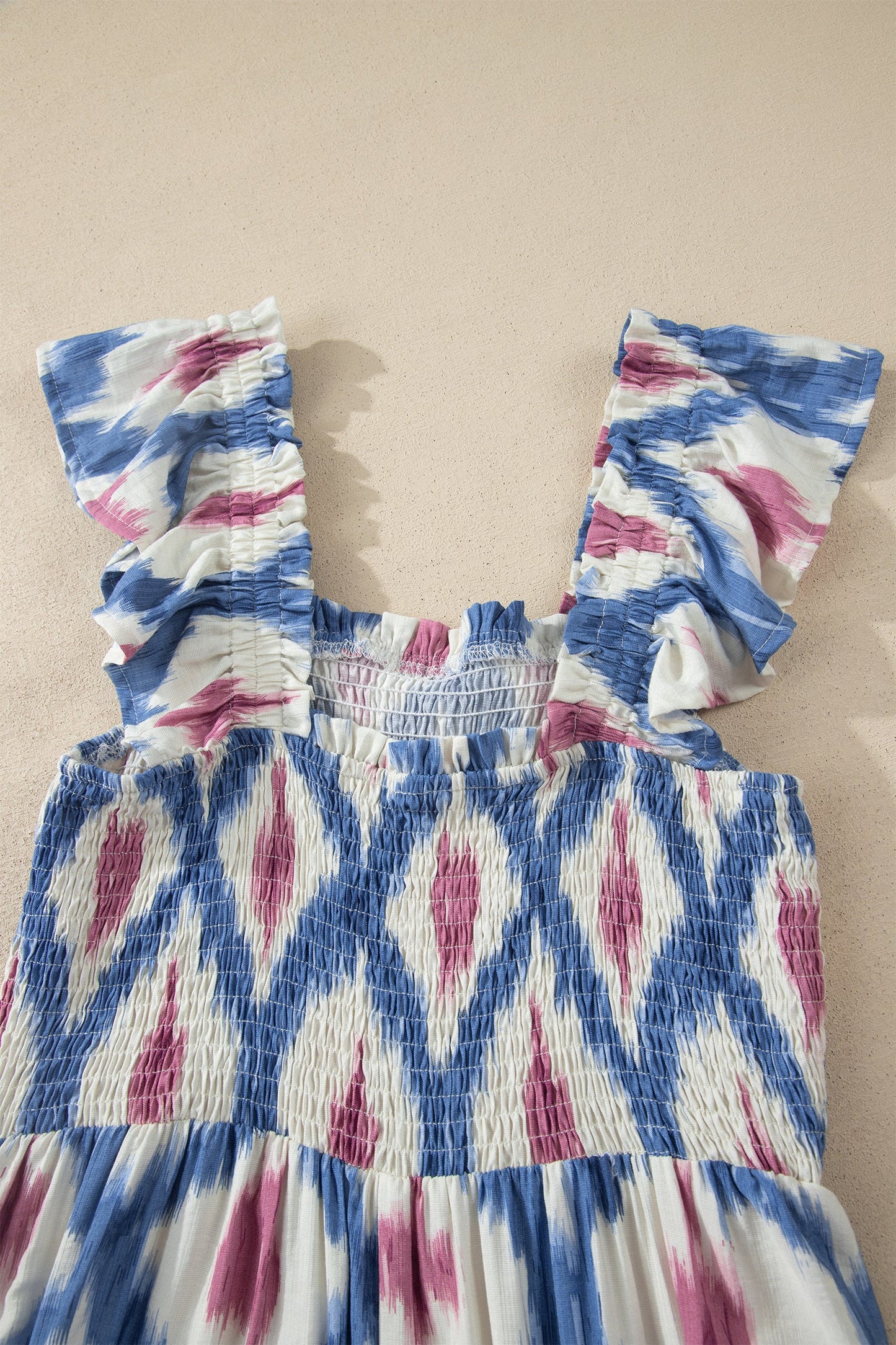 Sky blue ikat-pattern dress bodice with ruffle sleeves and gathered waist