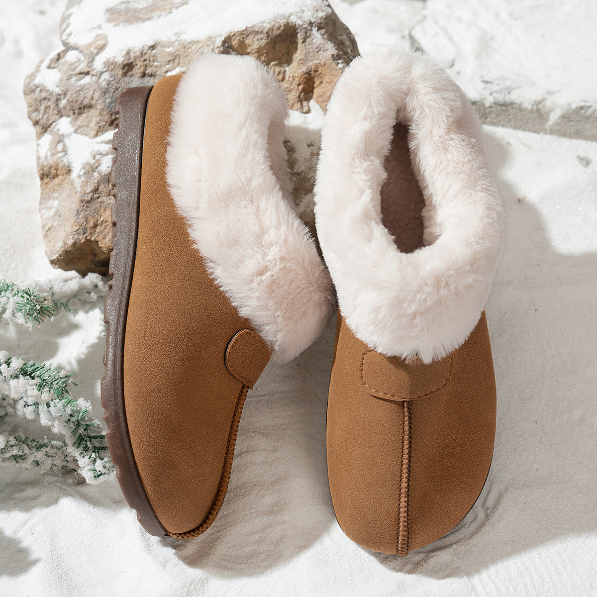 Women's snow boots in tan suede with white faux-fur lining and side hook strap