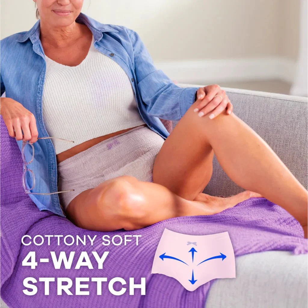 Light pink brief-style women’s discreet underwear on seated woman, soft stretch fit