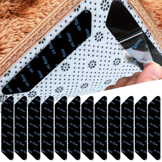 Anti-slip rug grips: white dotted backing with black adhesive strips