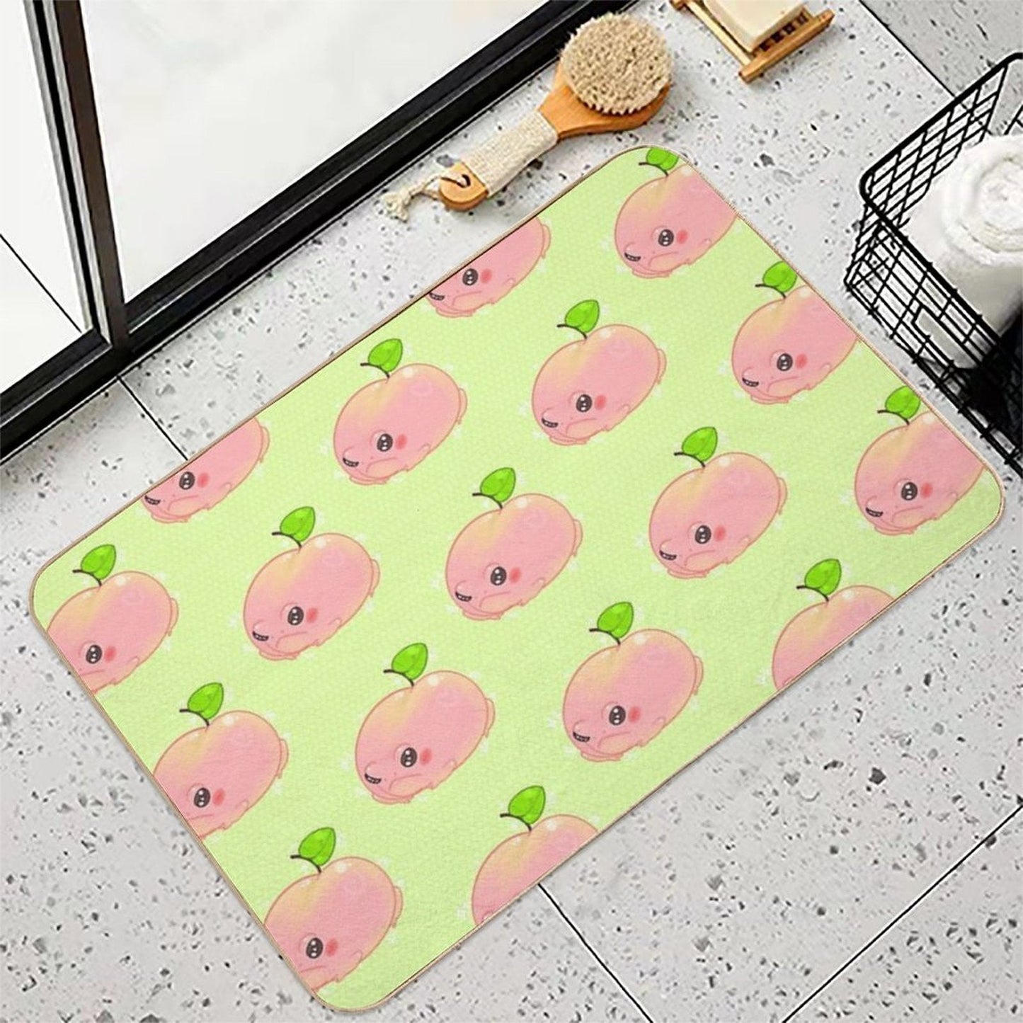 Peach frog bath mat with repeating pink frog faces and green leaves pattern