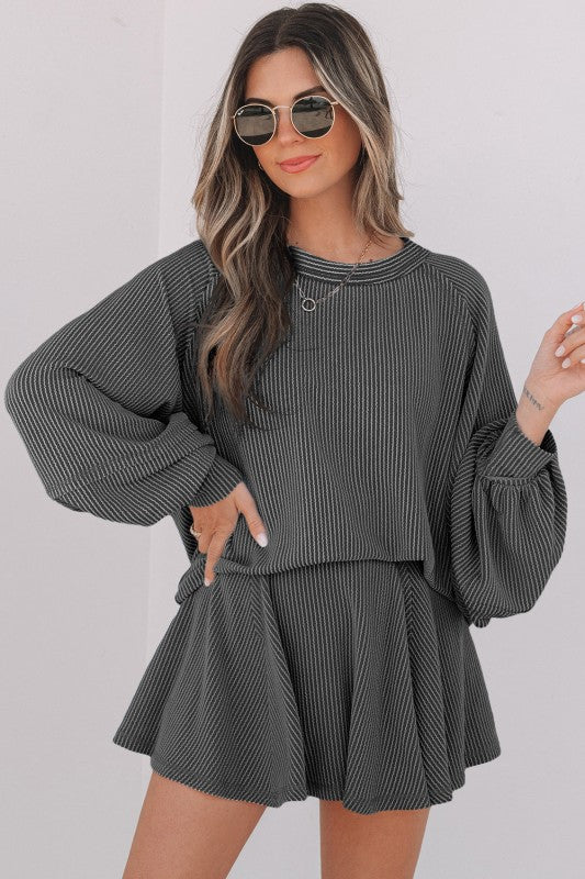 Corded top and ruffle mini skirt set in dark gray, long sleeves and pleated ruffle skirt