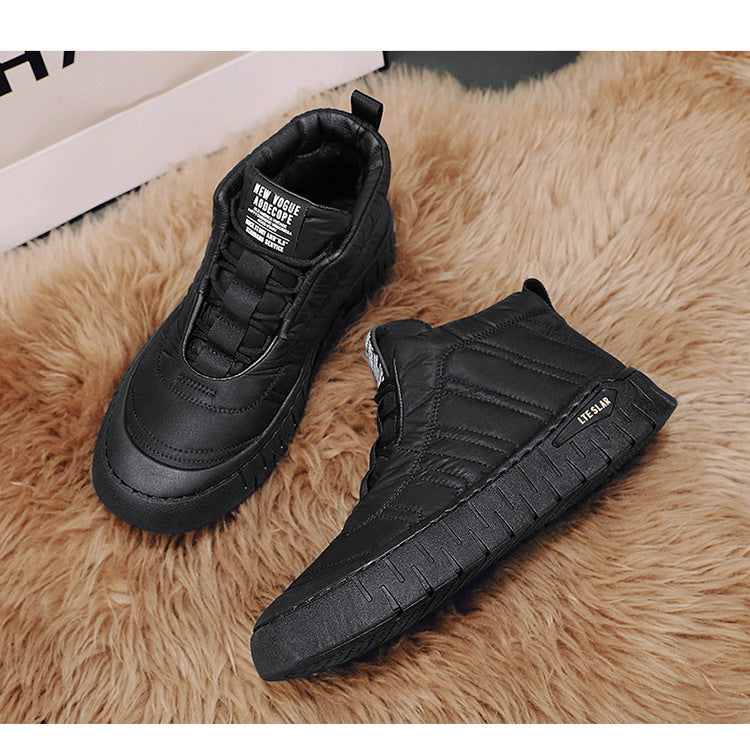 Black high-top lace-up winter boots with quilted panels and rugged tread sole