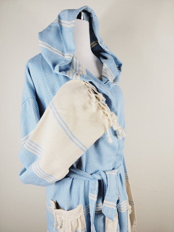 Light blue hooded unisex robe with geometric print, cream pocket panel and tie waist