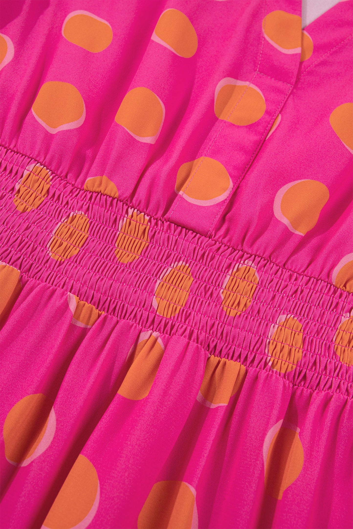 Rose high waist midi dress with orange oval polka dots and gathered smocked waist