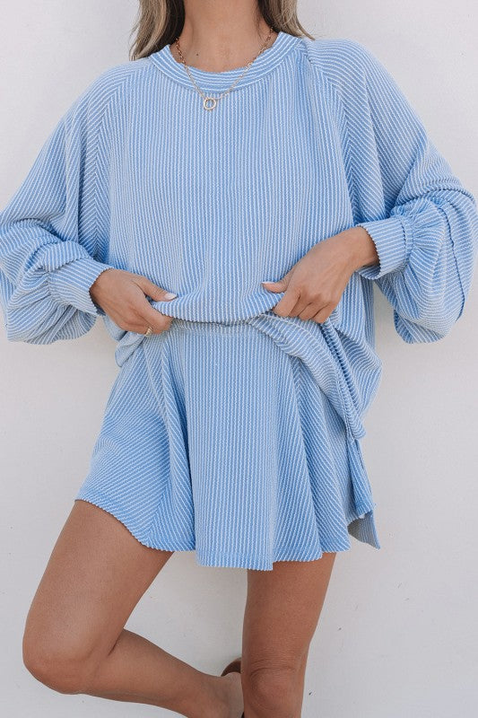 Light blue corded top and ruffle mini skirt set, round neckline, gathered waist, sleeves