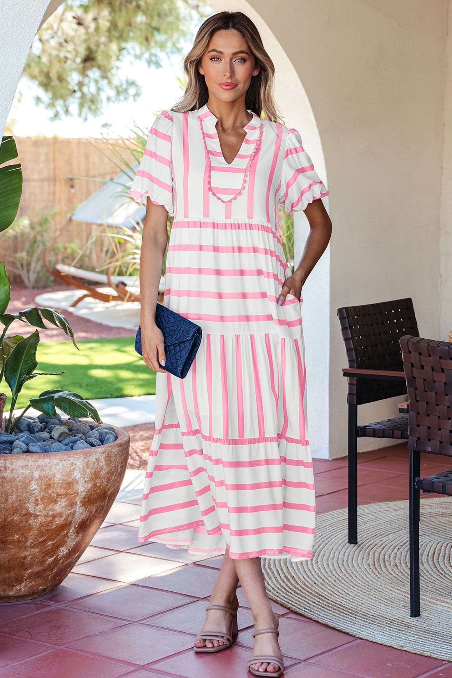 Pink striped half-sleeve tiered vacation dress with ruffle V-neck and tiered skirt