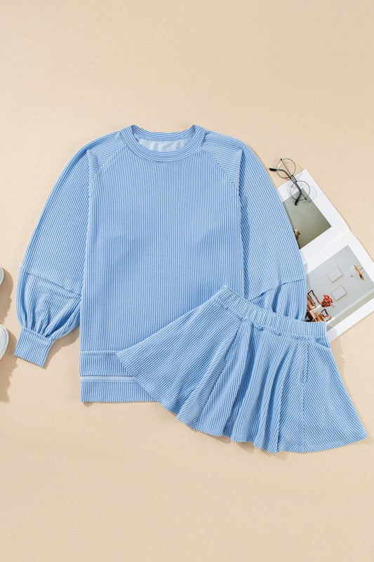 Corded top and ruffle mini skirt set in light blue, long sleeves and tiered skirt