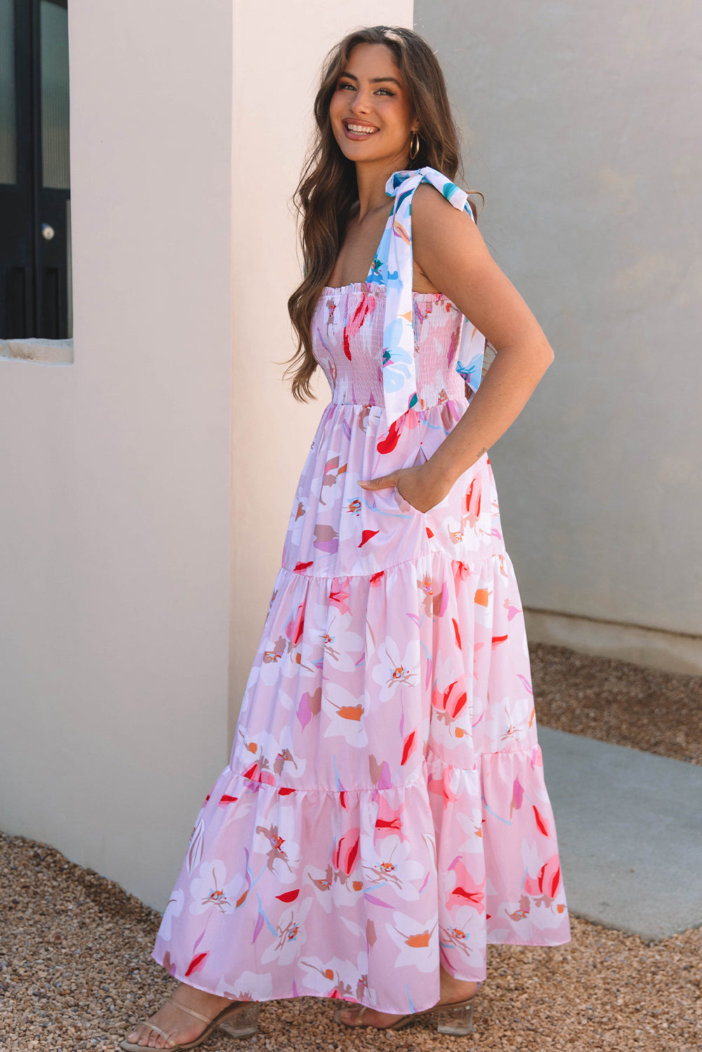 Pink floral tiered maxi dress with smocked bodice and tied shoulder knots