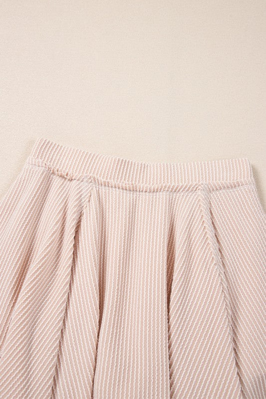 Ruffle mini skirt waistband and pleats, blush pink striped fabric