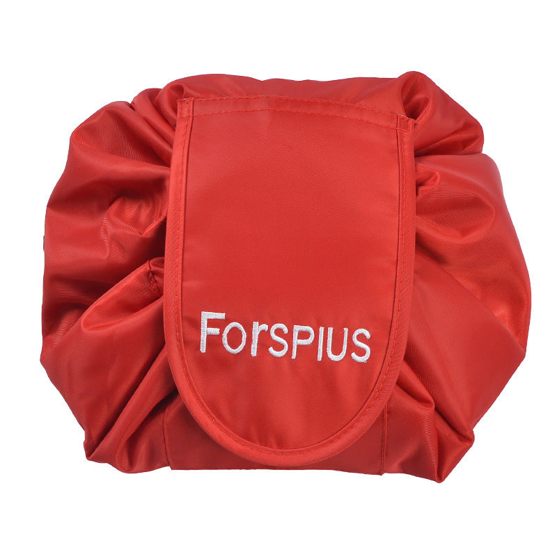 Red waterproof drawstring toiletry bag with front pouch and ruched sides