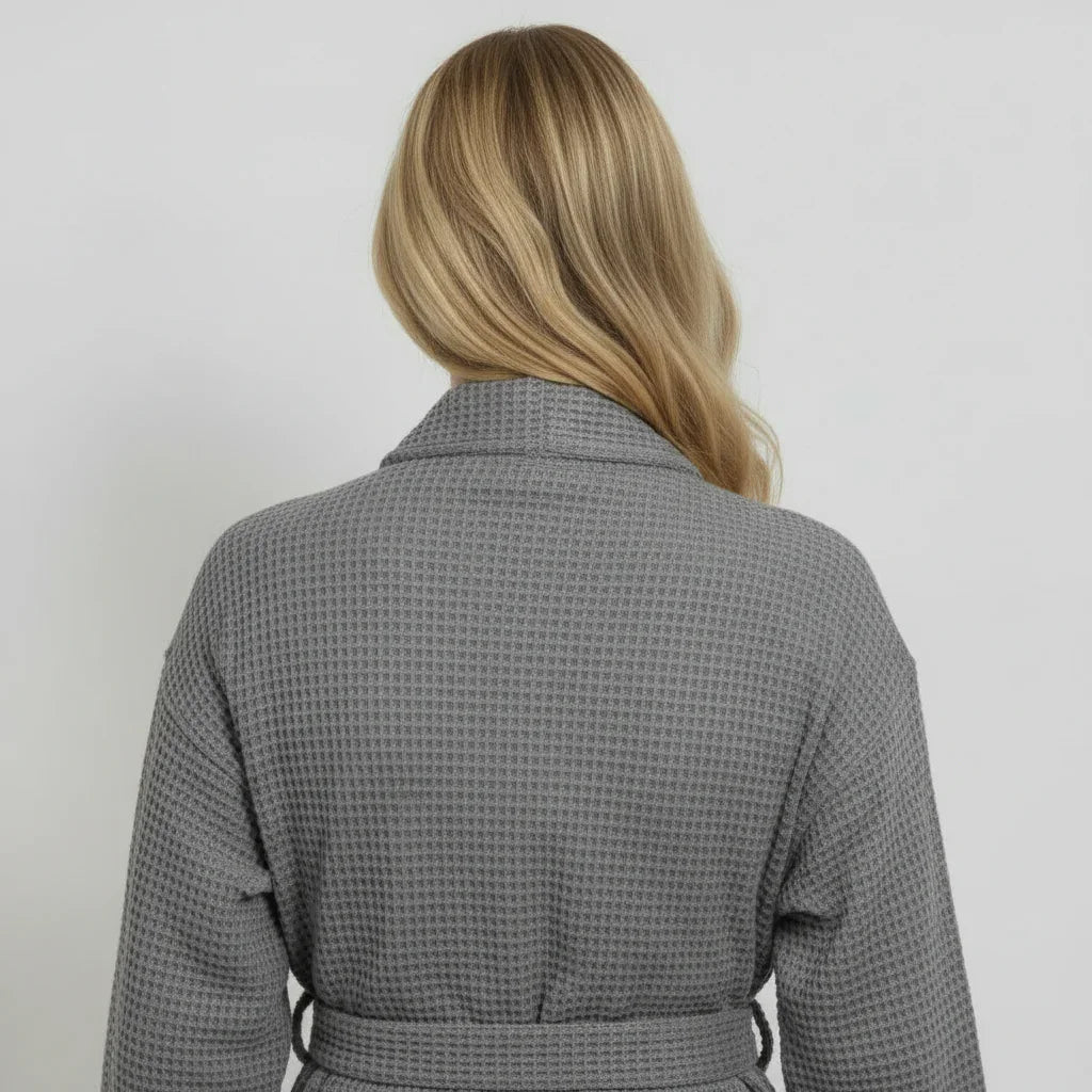 Women’s waffle robe in gray, back view with tie belt at waist.