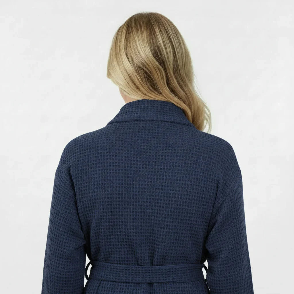 Women’s waffle robe in navy, back view with tie belt at waist.