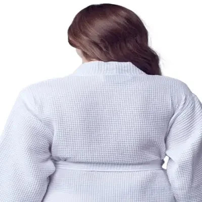 White waffle-texture women’s robe close-up, back view with waist belt tie at center