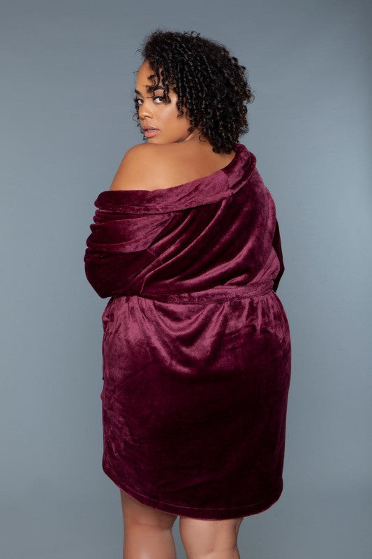 Burgundy plush robe with hood, draped collar, wide sleeves, and tie belt