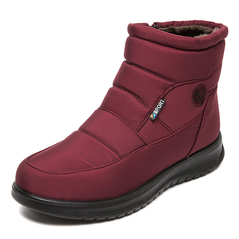 Women’s burgundy ankle boots with stitched panels and cushioned inner lining