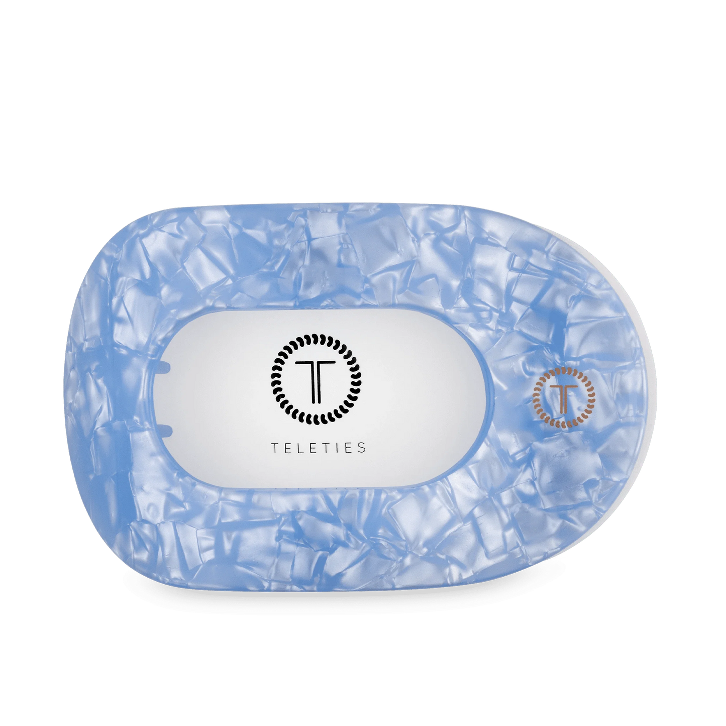Large light blue flat round hair clip with crinkled finish and TELETIES logo