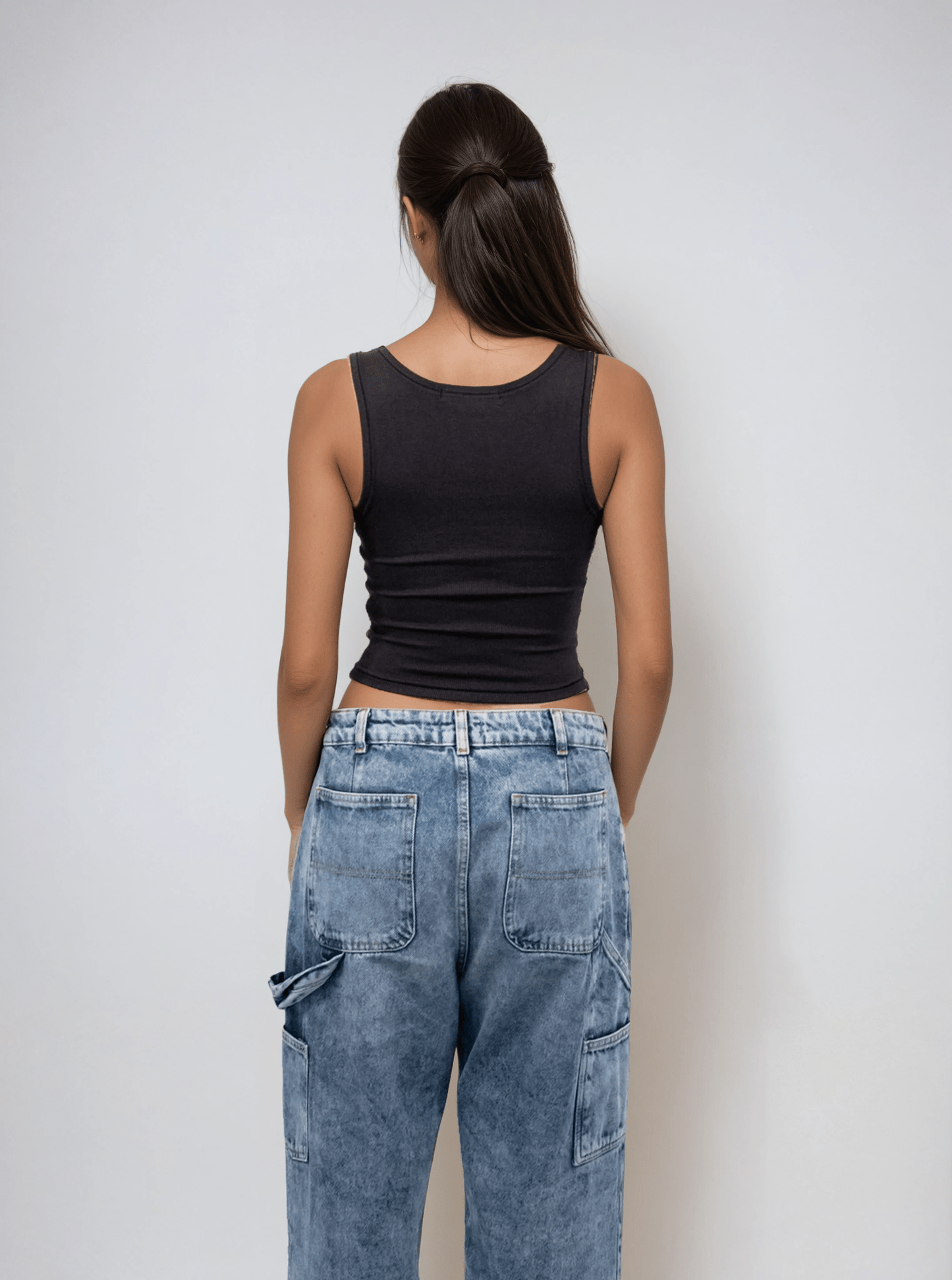 Black body tank with scoop back and sleeveless cut