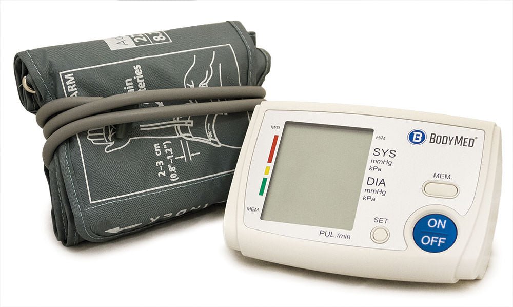 BodyMed digital blood pressure monitor with dark cuff and visible inflation bladder