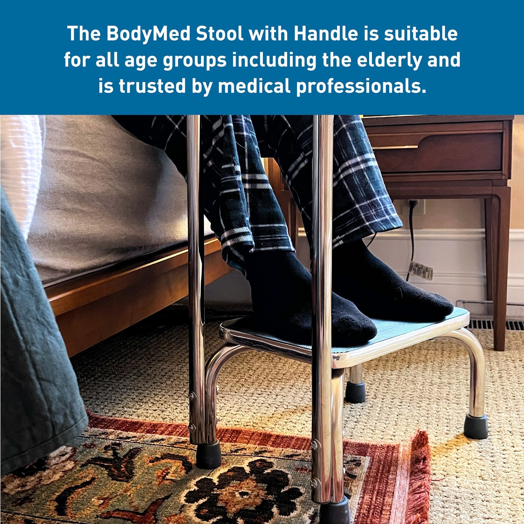 Portable step stool with black platform and chrome hand handle; stable rubber feet.