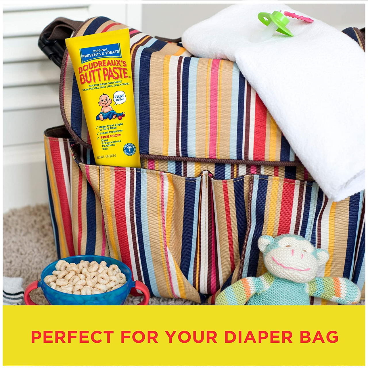 Original Boudreaux's Butt Paste bottle in diaper bag, Prevents & Treats label visible